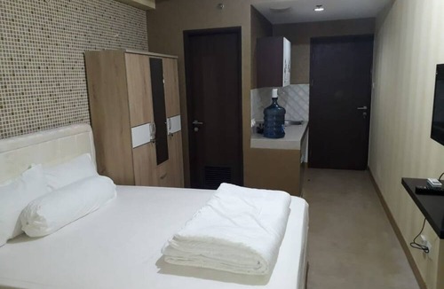 Cibaduyut Hotel | EXPRESS O 91863 Mekarwangi M-square Apartment By Santosa Property