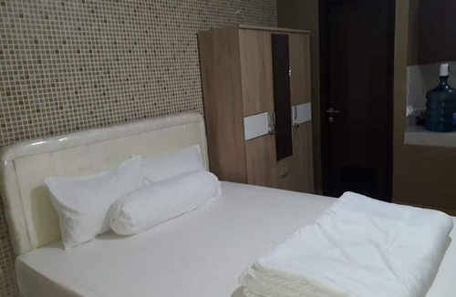 Cibaduyut Hotel | EXPRESS O 91863 Mekarwangi M-square Apartment By Santosa Property
