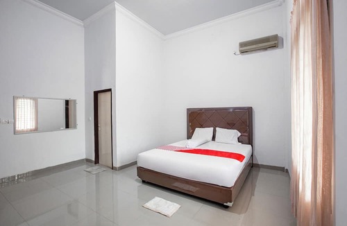 Jambi Hotel | Hotel O Homestay Romauli Kampung Radja