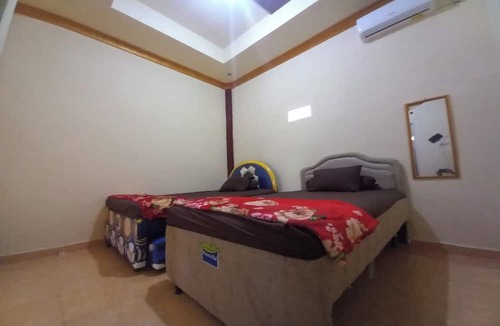Bailangu Hotel | OYO 90731 E-kreasi Home