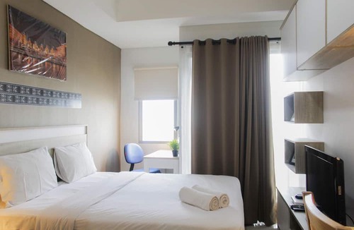 Panunggangan Utara Apartment | Bright Studio Apartment at Springwood Residence