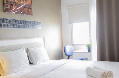 Panunggangan Utara Apartment | Bright Studio Apartment at Springwood Residence