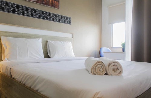 Panunggangan Utara Apartment | Bright Studio Apartment at Springwood Residence