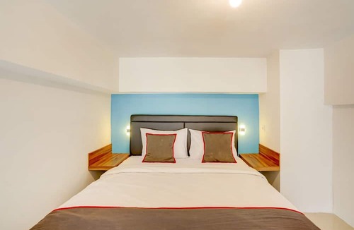 Waru Hotel | Super OYO Collection O 30 Amega Crown Sub