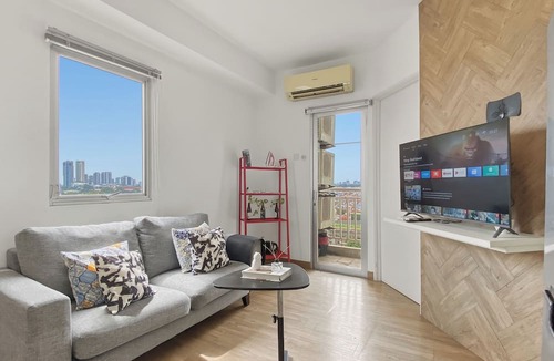 Cipulir Apartment | Lavish White 1Br With Working Room At Pakubuwono Terrace Apartment