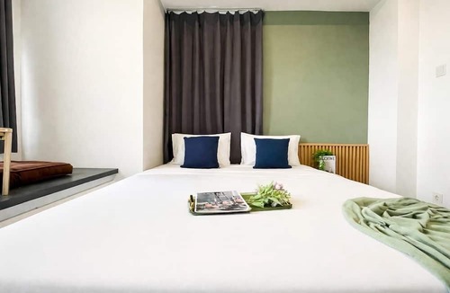 Panunggangan Utara Apartment | Bright And Relaxing 2Br At Collins Boulevard Apartment