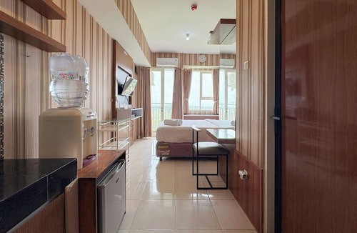 Depok Apartment | Classic Striped Touch Studio At Malioboro City Apartment