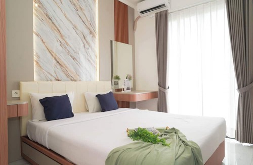 Balaraja Apartment | Bright And Homey Studio Room At Apartment Sky House Bsd