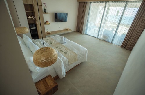 Kubutambahan Apartment | Bohemian Beachfront Apartments