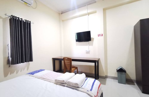 Sangatta Utara Hotel | OYO 95059 Ikon Guesthouse
