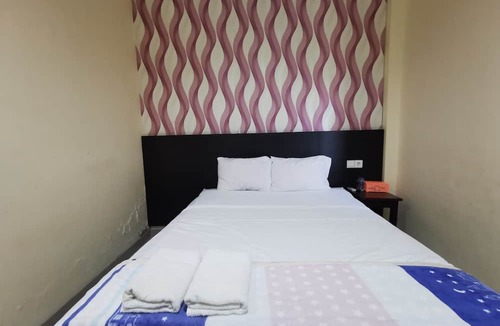 Sangatta Utara Hotel | OYO 95059 Ikon Guesthouse