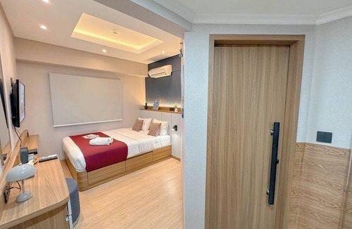 Surabaya Apartment | Modern Look With Wooden Accent 3Br At Kondominium Puncak Marina Apartment
