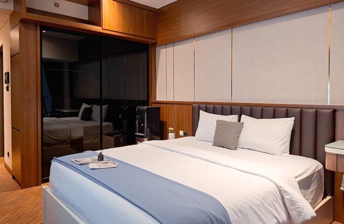 Pagedangan Apartment | Modern Rustic Studio Apartment At Carstensz Residence