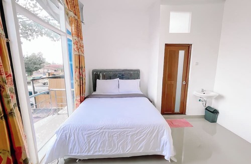 Pematangsiantar Hotel | Orien Guest House By Helocus
