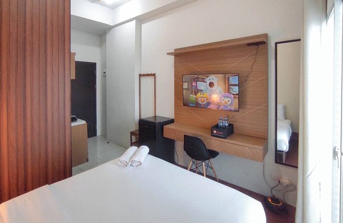 Sidoarjo Apartment | Homey Studio With Easy Pool Access Apartment At Suncity Residence