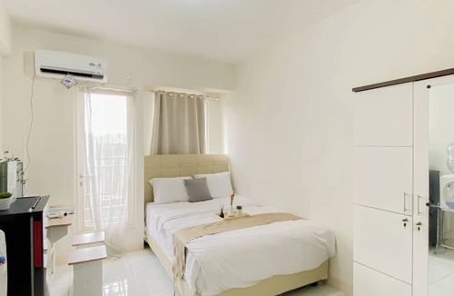 Pancawati Apartment | Simply Studio Room At Podomoro Golf View Apartment