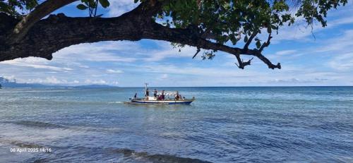 Langowan Resort | De BOUGENVILLE Tulap Beach Front