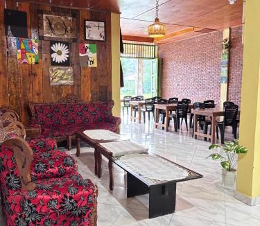 Tuk Tuk House | Toba Boi
