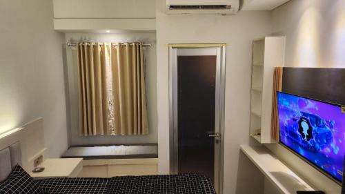 Bekasi Timur Apartment | Transpark Juanda by Aqillaroom