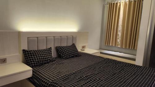 Bekasi Timur Apartment | Transpark Juanda by Aqillaroom