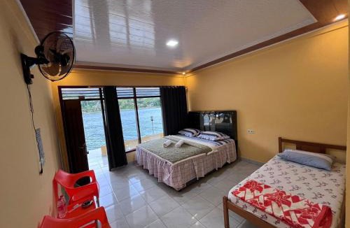 Tuk Tuk House | Abadi Guest House Tuktuk