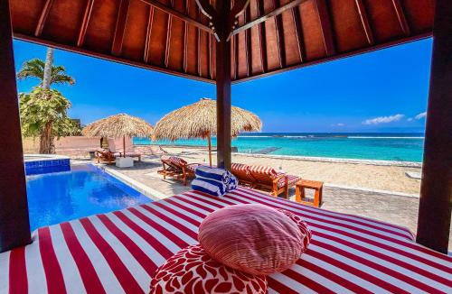 Candi Dasa Villa | Villa Talia Vashti - Oceanfront villa with Private Sea Access, Pool & Cook