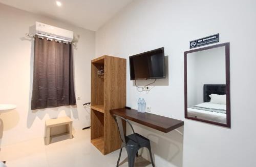 Patrang Hotel | Happy Family Homestay Jember Mitra RedDoorz