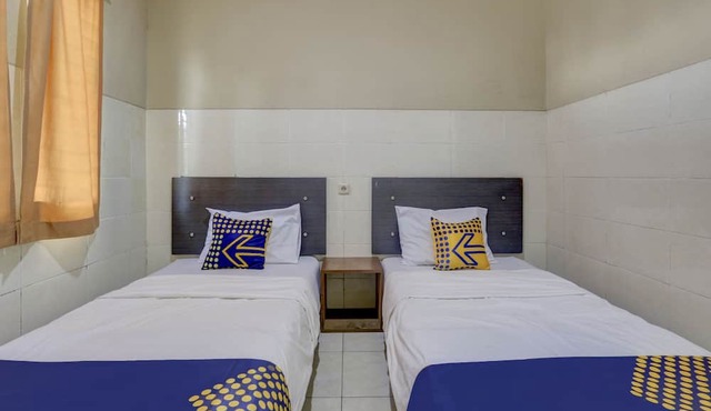 OYO Life 90159 Puri Asoka Guest House in Muncar