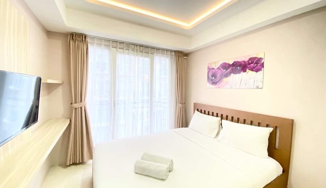 Homey Studio Room At Grand Asia Afrika Apartment