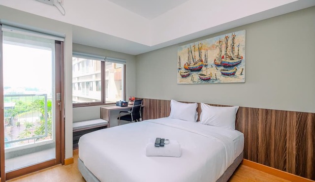 Comfortable Pool View Studio Room at LRT City Jatibening Apartment in Bekasi