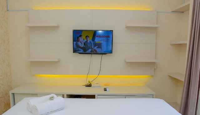 Minimalist and Cozy 1BR Apartment at The Boulevard