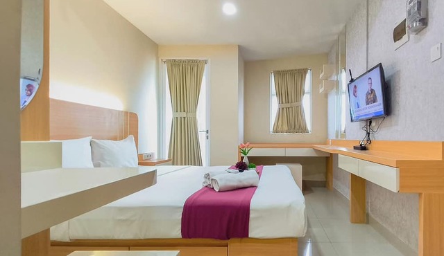 Comfy Modern Look Studio Room At Apartment Grand Dharmahusada Lagoon in Surabaya
