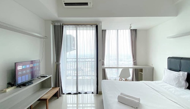 White Toned Studio At Lrt City Bekasi Apartment