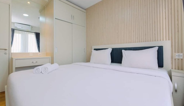 Restful and Modern 2BR at Sentul Tower Apartment