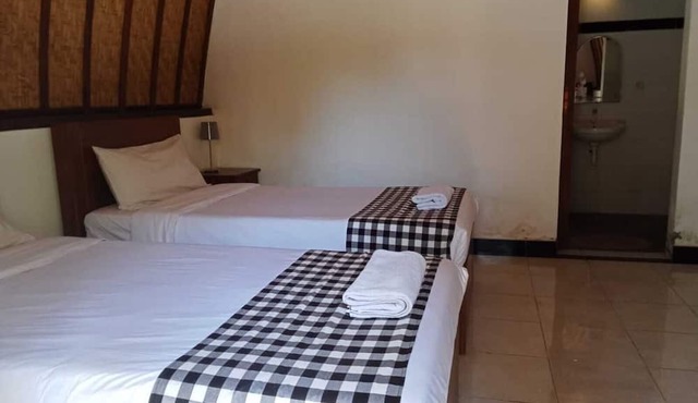 Ratu Cottage by OurStory Travels