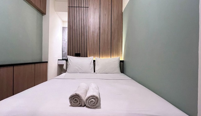 Warm And Homey 2Br At Vida View Makassar Apartment
