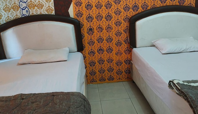 Hotel O Wisma Hamalau SyariahNearPulau Bromo Pedestrian Bridge