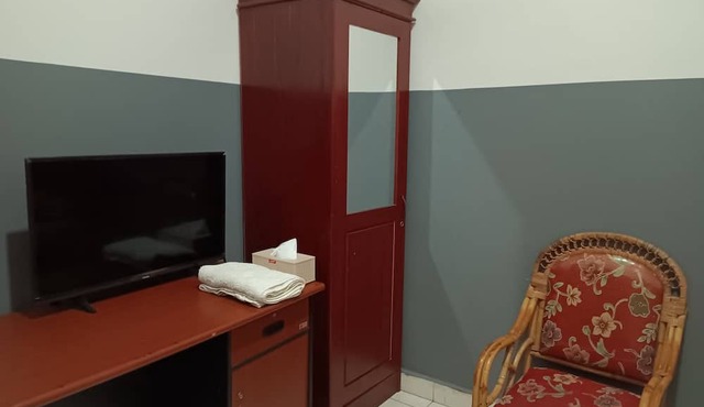 OYO 93117 Penginapan Tiga Dara