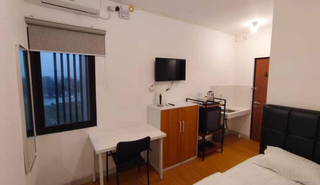 Golden Knight Suites | EcoHome Apartment
