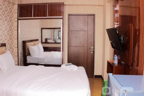 Cozy Studio at Lagoon Bekasi Town Square Apartment By Travelio in Bekasi