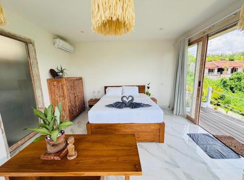 Trika Surfcamp Bali in Airsatang