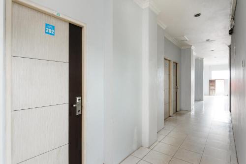 RedDoorz Syariah near Q-Mall Banjarbaru in Martapura